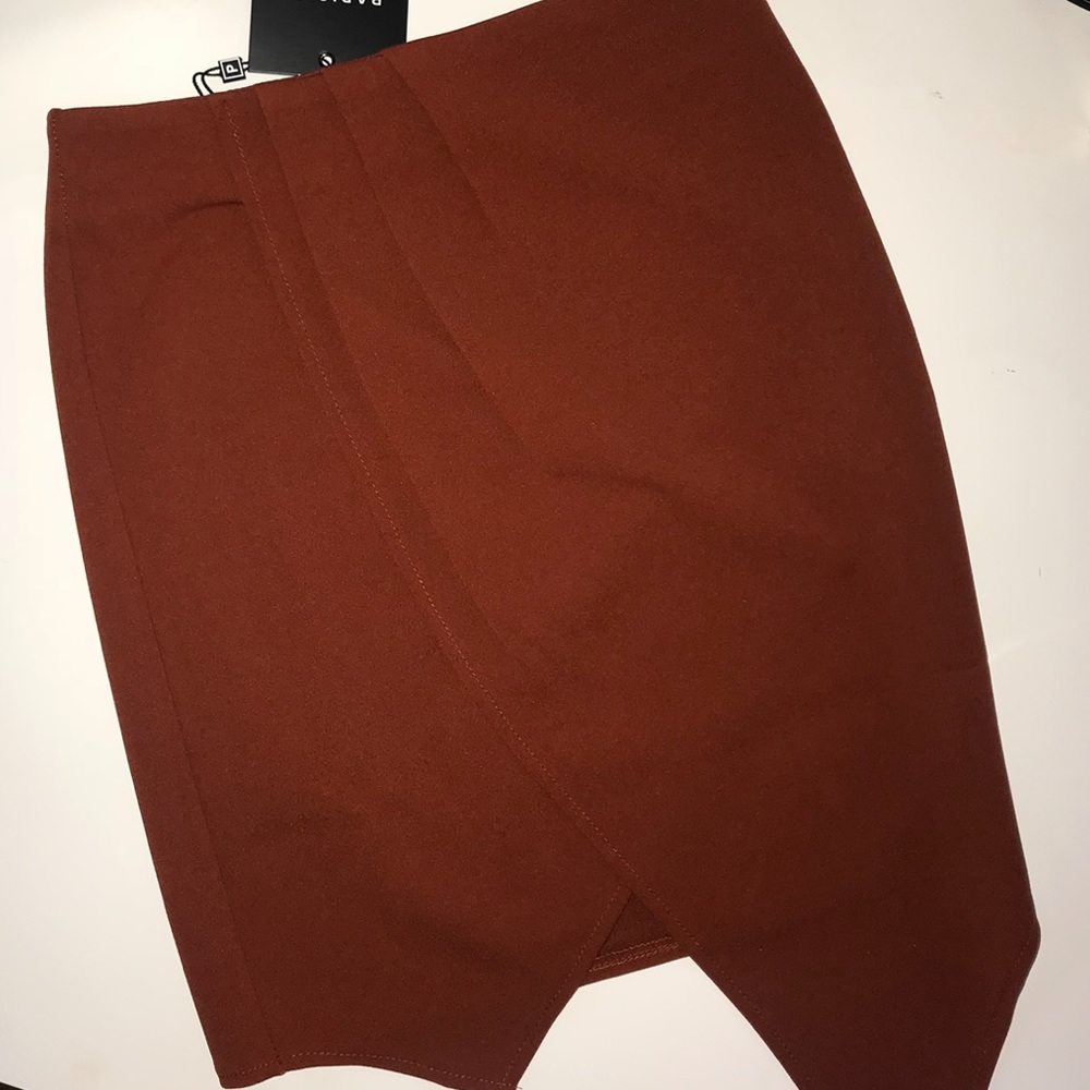 A symmetrical skirt brand new.. sizes 4, 6, 8,